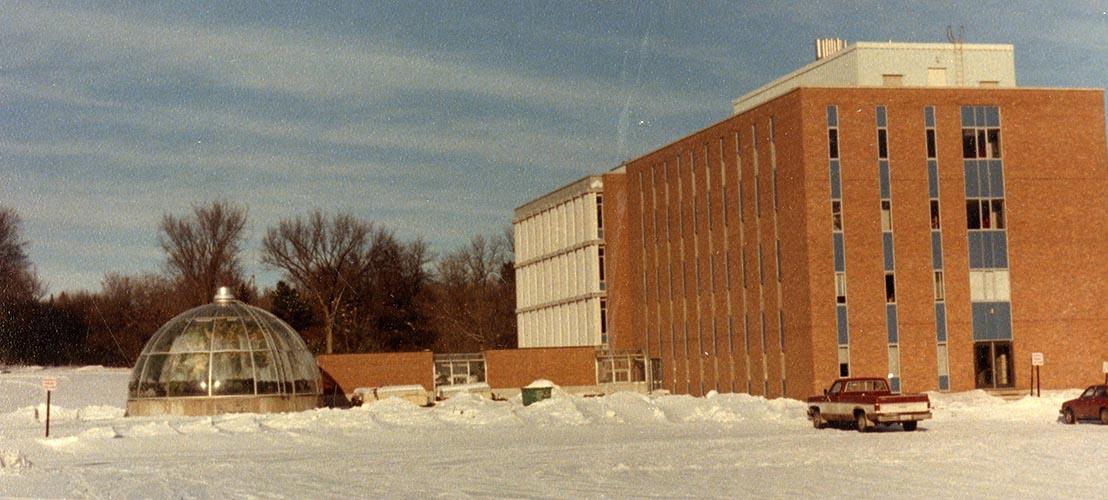 The domed conservatory (pictured here in 1984) was added to the western side of the Science Building in 1968. A greenhouse would be added adjoining the conservatory in 1986.