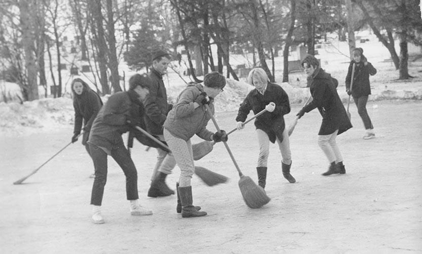 Students playing broomball south of Pine Hall in 1967.