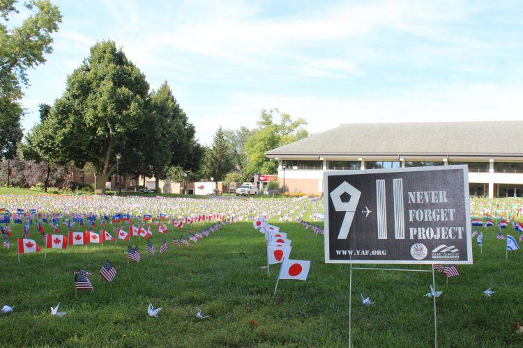 Many flags, representing the victims of the 9/11 terrorist attack, are set up on the Campus Mall